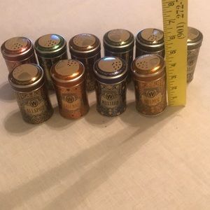 11 Vintage Watkins spice cans.